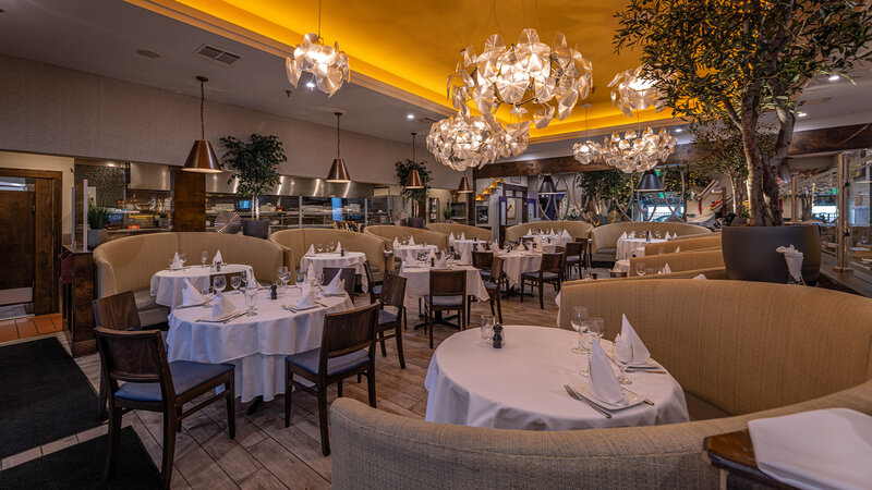 Main Dining Room with many set tables